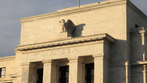 Fed raises its policy rate by 75 basis points as it prepares to slow pace of hikes
